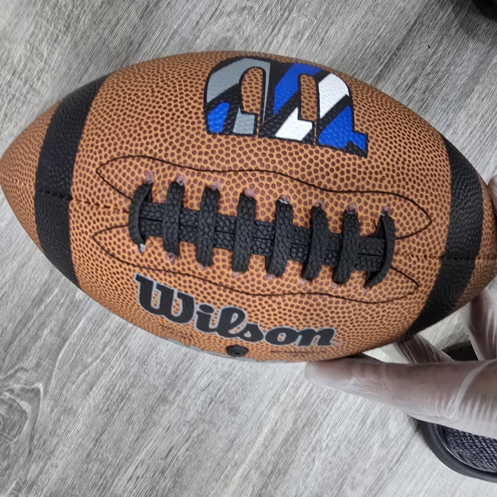 Wilson Brown and Black Football with Blue Accents